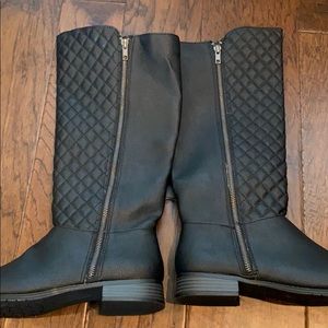 Black boots. Never worn